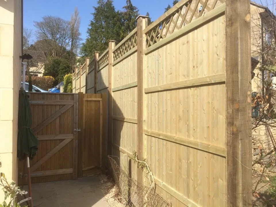 8ft high trellis top T&G panels with 4x4 wooden posts