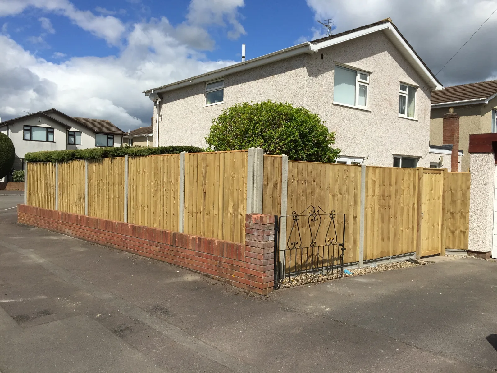 Closeboard panels with concrete posts