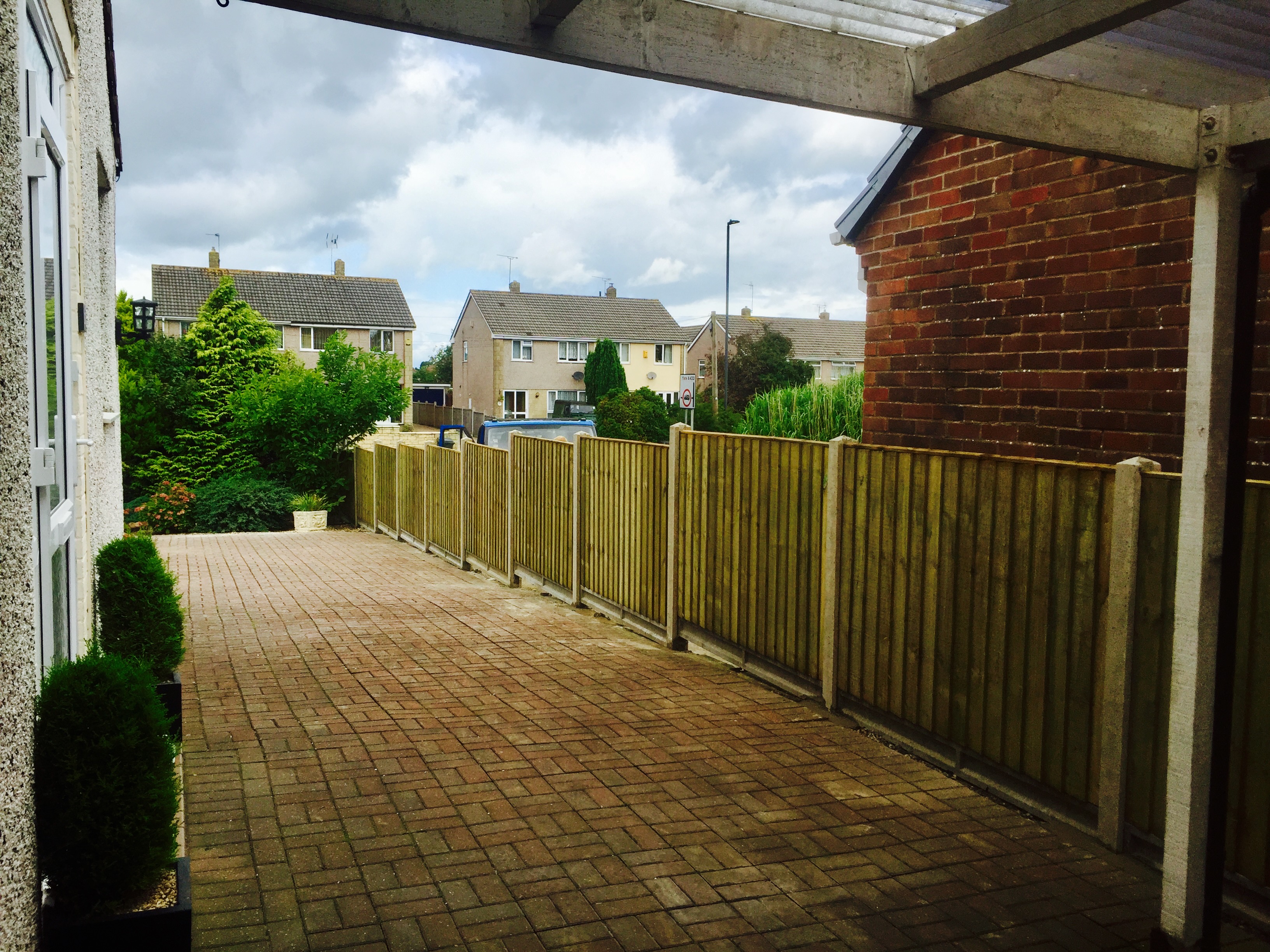 Closeboard panels with concrete posts